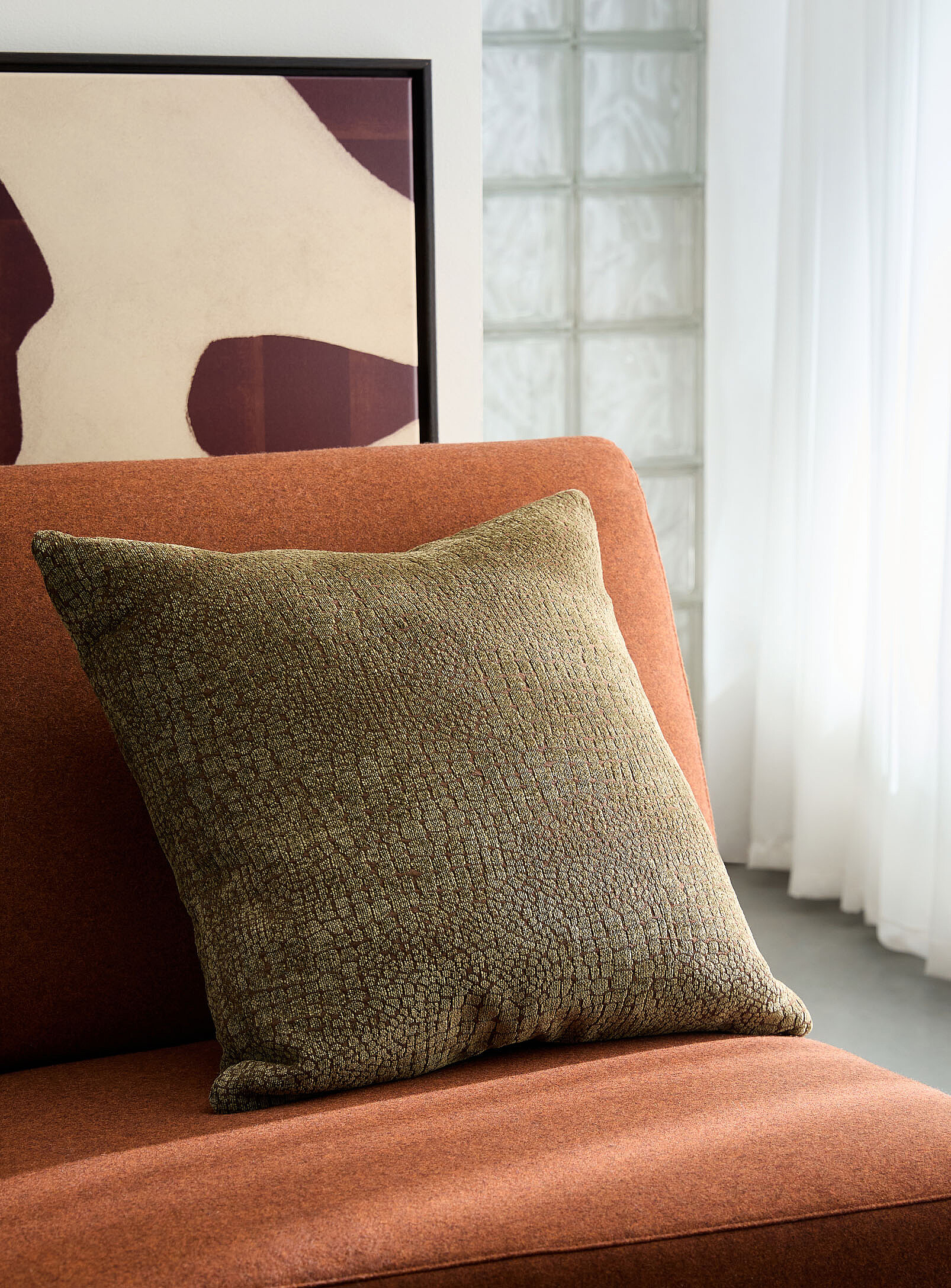 Le coussin déhoussable velouté peau de serpent