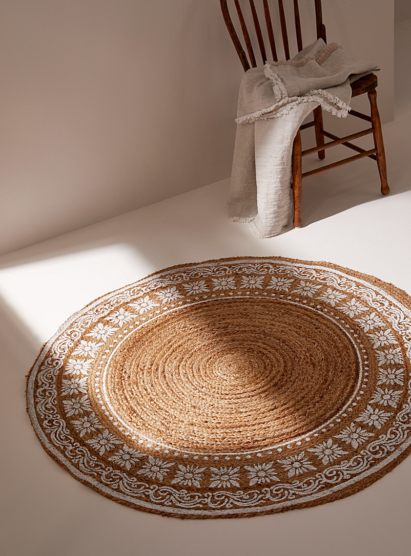 Simons Maison Patterned Brown Painted flowers jute circular rug 120 cm in diameter