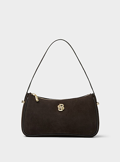 Le sac d'&eacute;paule su&egrave;de logo m&eacute;tallique