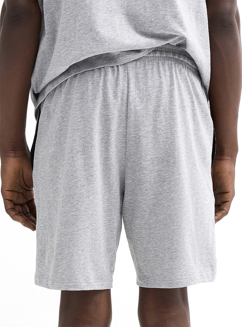 BOSS: Le short d&eacute;tente jersey extensible Noir pour homme