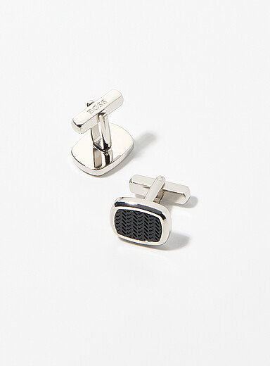 Les boutons de manchette chevrons noirs