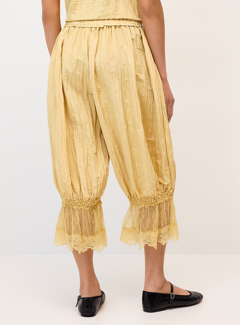 Twik: Le pantalon <i>bloomer</i> satin&eacute; effet froiss&eacute; Jaune pour femme