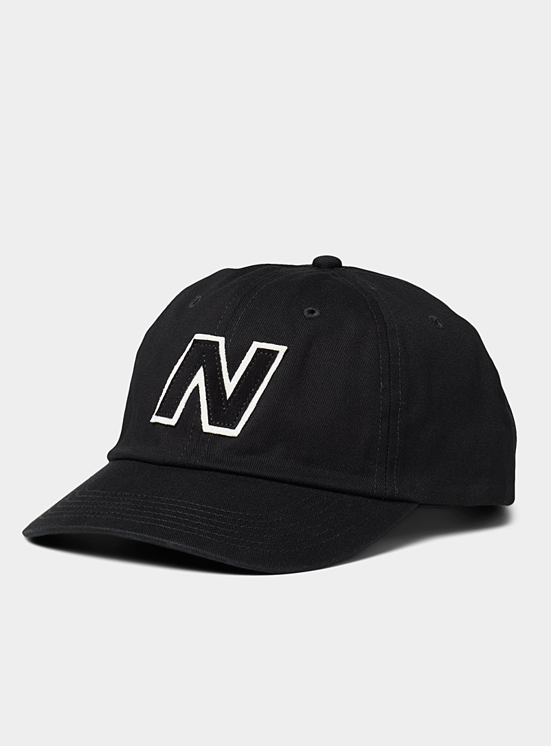 New Balance: La casquette baseball écusson logo Noir pour femme