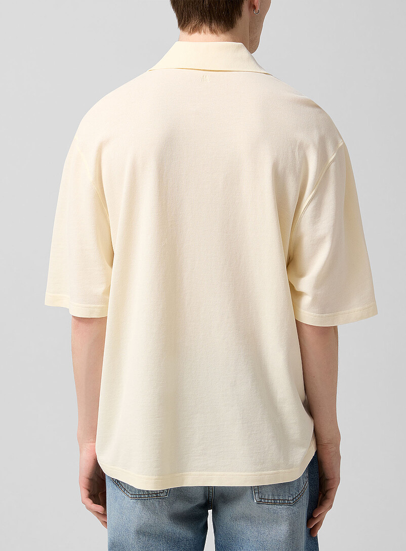 Ami: Le polo piqu&eacute; logo crochet Blanc cass&eacute; pour homme