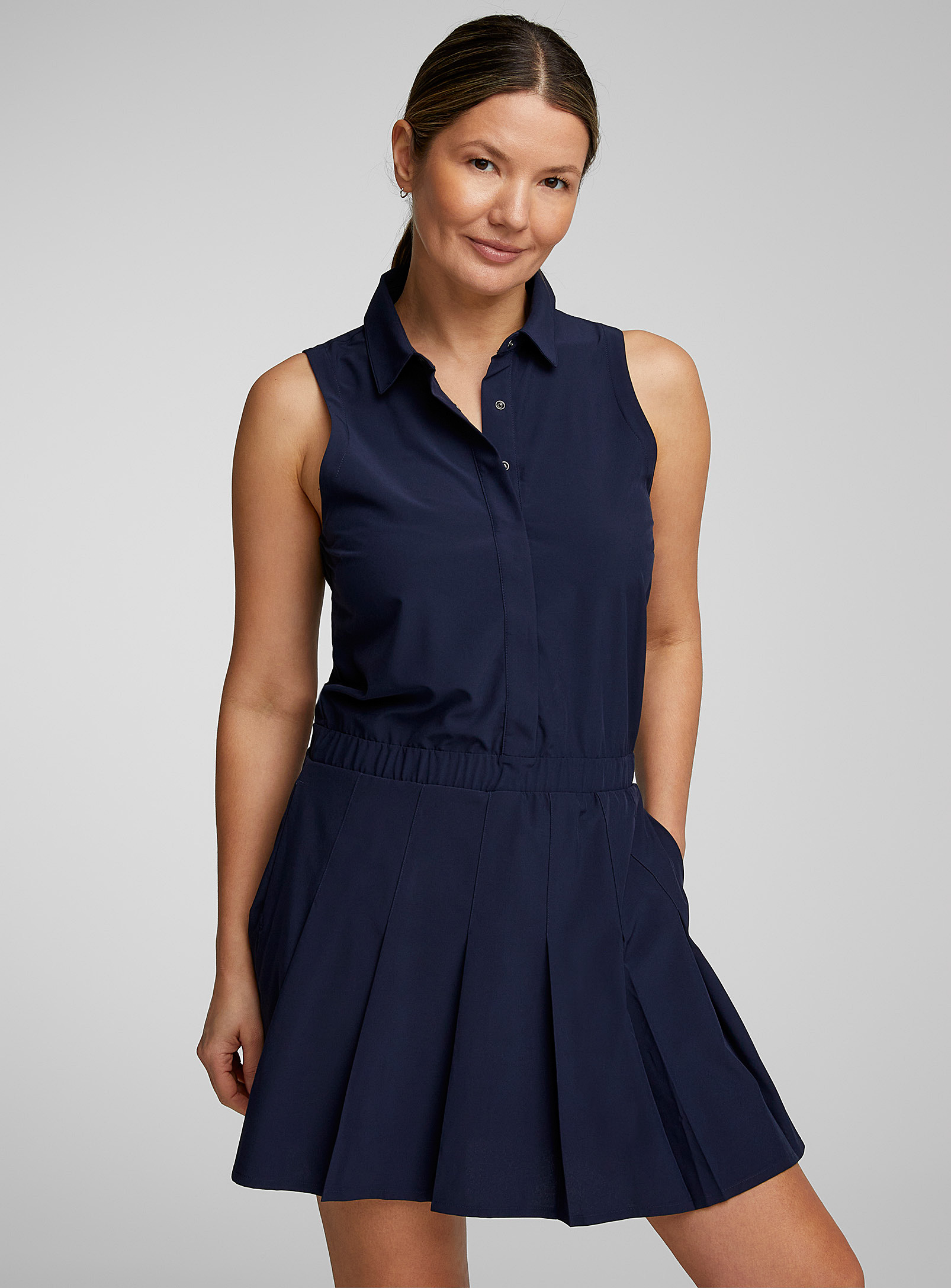 Puma Golf Pleated-skirt Sleeveless Golf Dress In Marine Blue