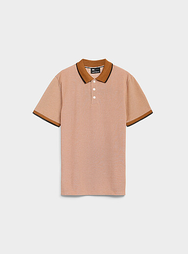 Le polo piqu&eacute; maille faux uni