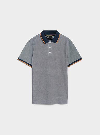 Le polo piqu&eacute; maille faux uni