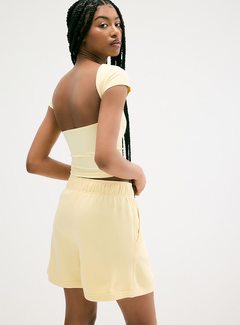Twik: Le short molleton mi-cuisse Orange pour femme