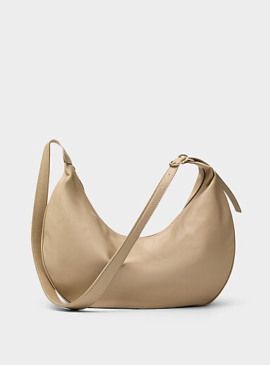 Textured-leather rounded hobo bag <b>Exclusive collection from Italy</b>