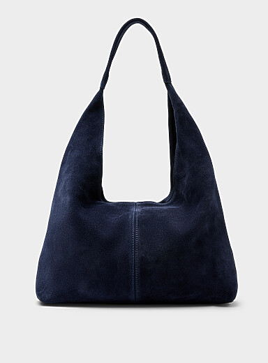 Le sac besace su&egrave;de souple <b>Collection exclusive d'Italie</b>