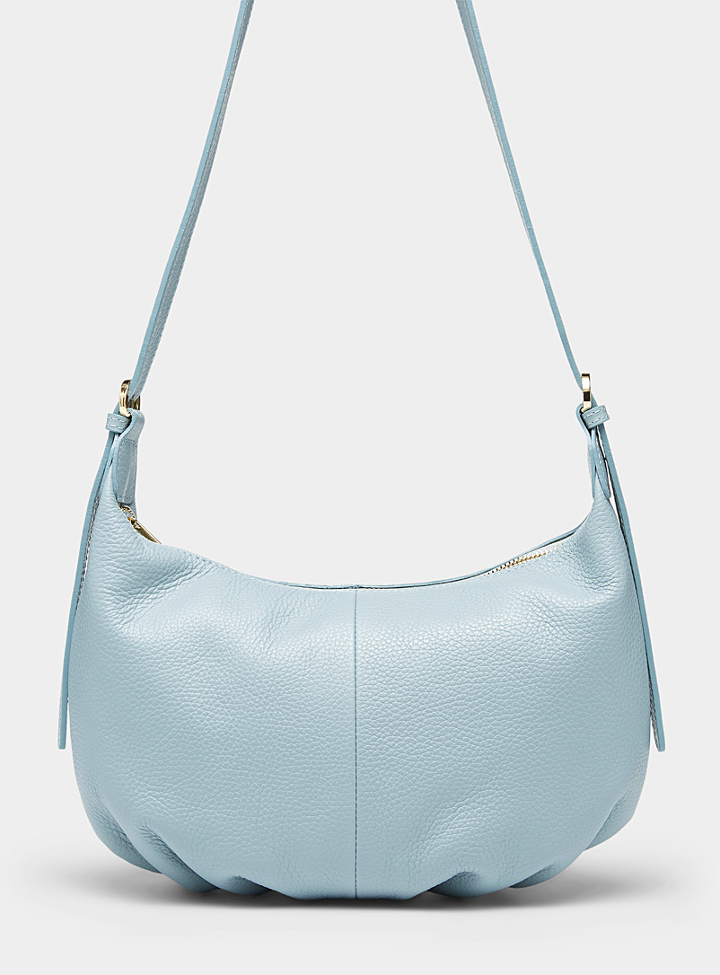 Simons Baby Blue Grained leather half-moon crossbody bag for women