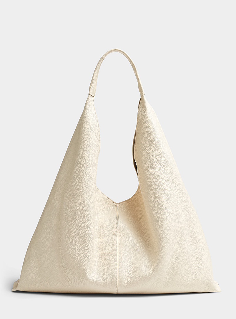 Simons Ivory White Pebbled leather saddle tote From our exclusive collection of Italy for women