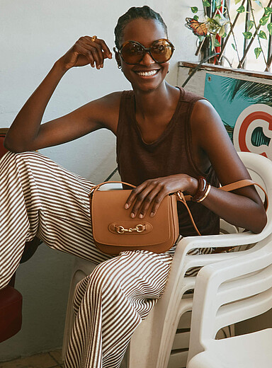 Metal buckle leather saddle bag <b>Exclusive collection from Italy</b>