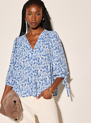 La blouse tapisserie fleurie manches nou&eacute;es