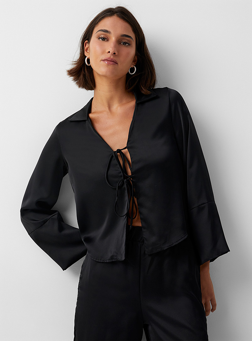 Icône Black Flowing satin knotted blouse for women