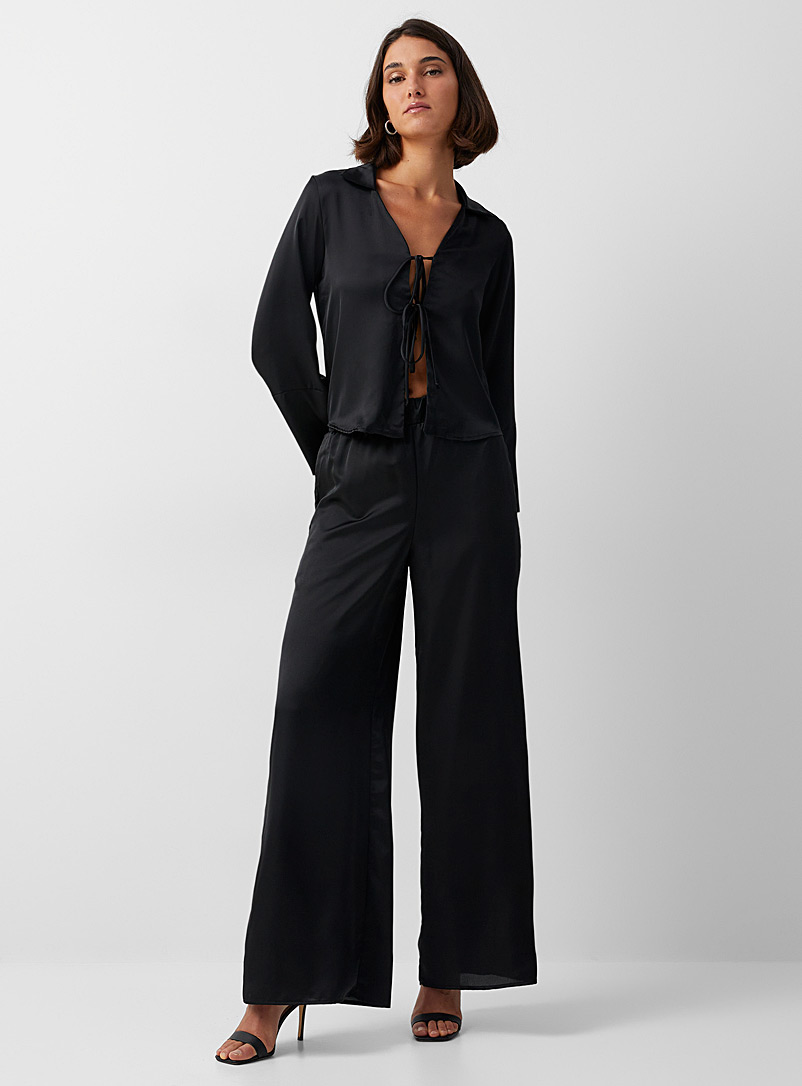 Icône: Le pantalon large satin fluide Noir pour femme