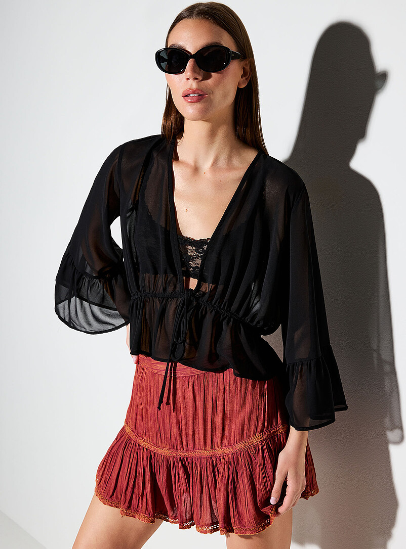 Ic&ocirc;ne: La blouse chiffon diaphane &agrave; nouer manches cloche Noir pour femme