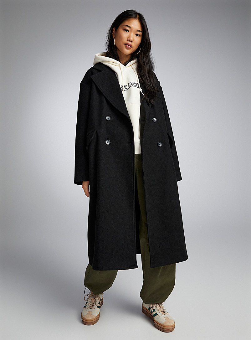 Twik: Le long manteau double boutonnage Noir pour femme