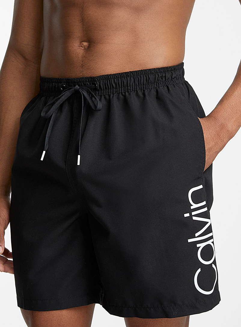 Solid logo swim trunk | Calvin Klein | Men's Swimwear Brands Online| Simons