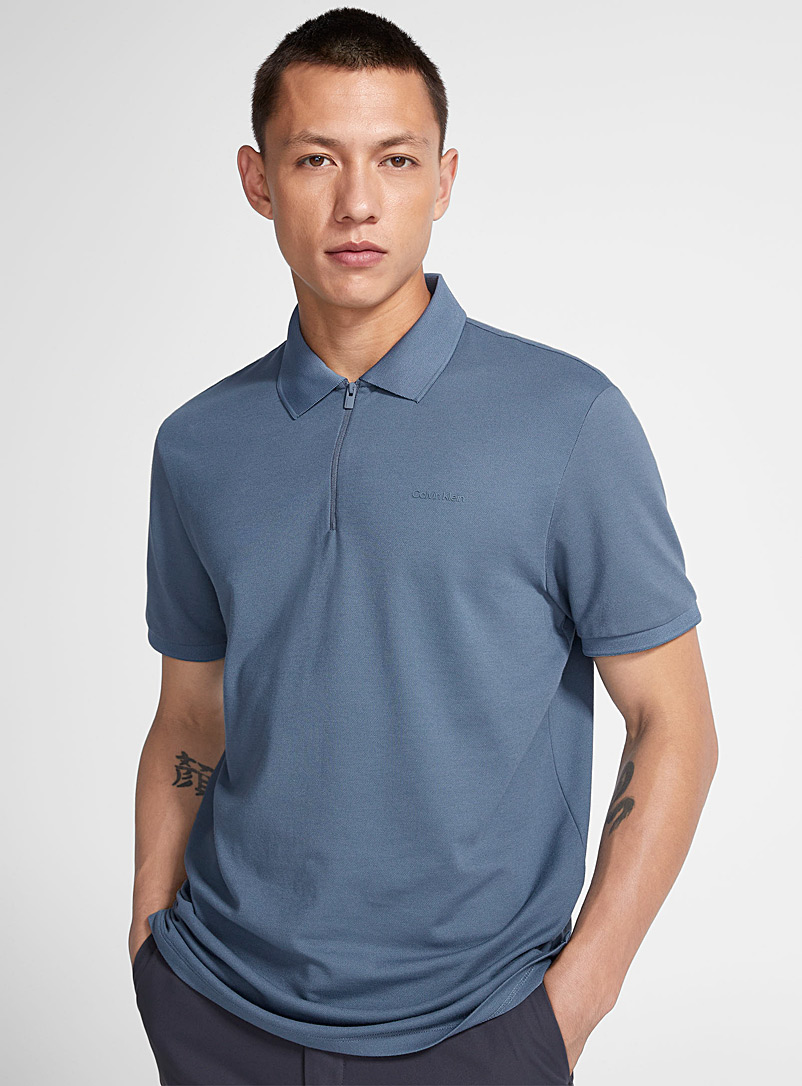 Calvin Klein: Le polo piqué col zippé Bleu pour homme