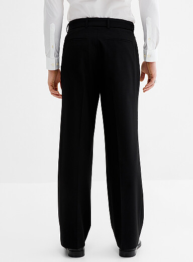 Le pantalon ceintur&eacute; &agrave; plis <b>Coupe Antwerp - Droite et ample</b>