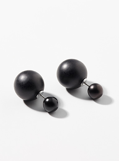 Les boucles d'oreilles recto verso billes monochromes