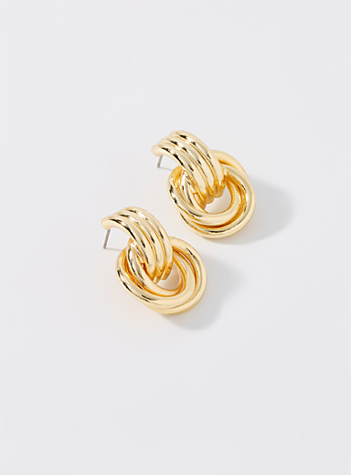 Golden interlocked hoop-style earrings