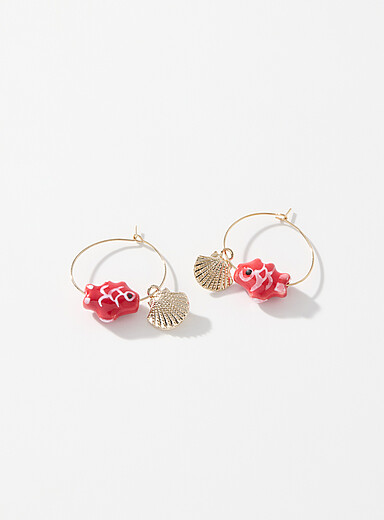 Les fins anneaux coquillage et poisson