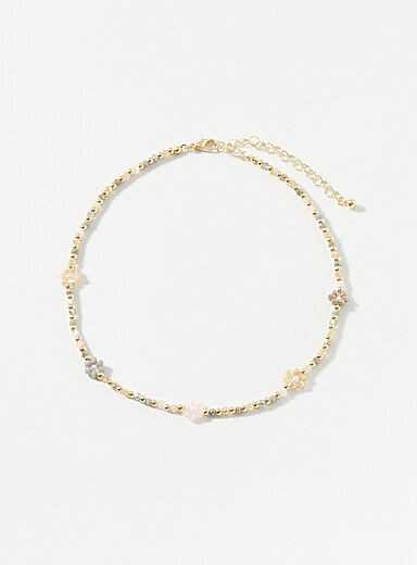 Le collier de billes fleurs