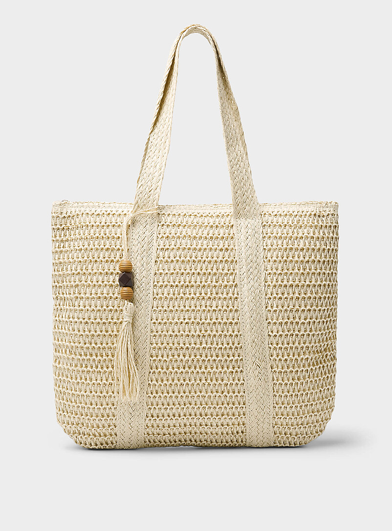 XL braided straw tassel-charm tote bag product image (primary)