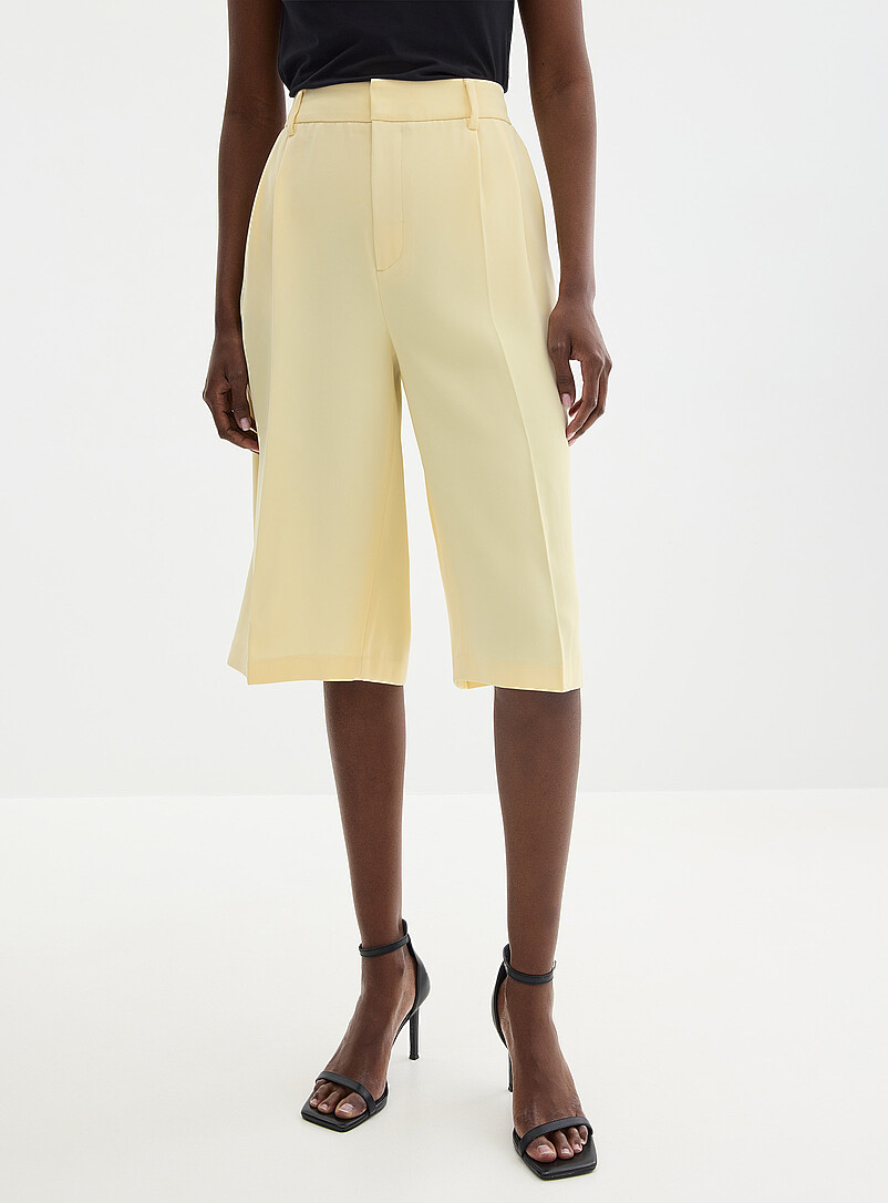 Contemporaine Corn/Vanilla Yellow Silky pleated long Bermuda short <b>Fit: Wide leg, high rise</b> for women