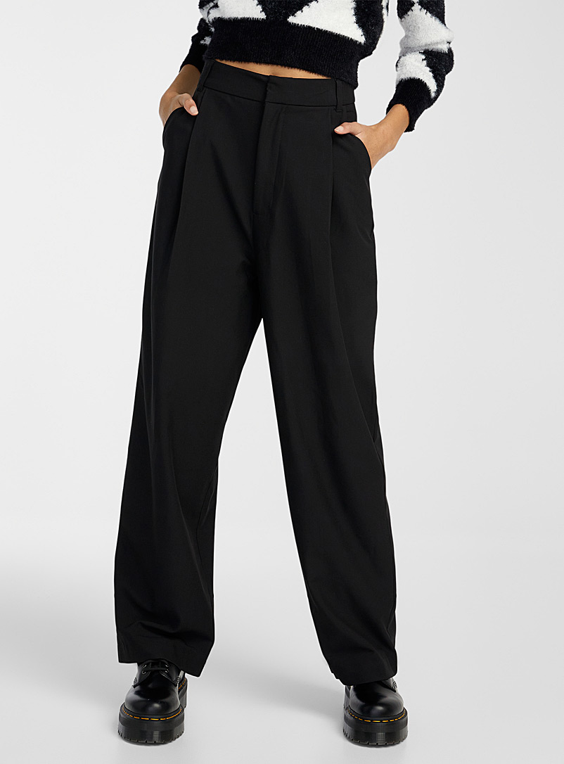 Twik: Le pantalon ample à plis Noir pour femme