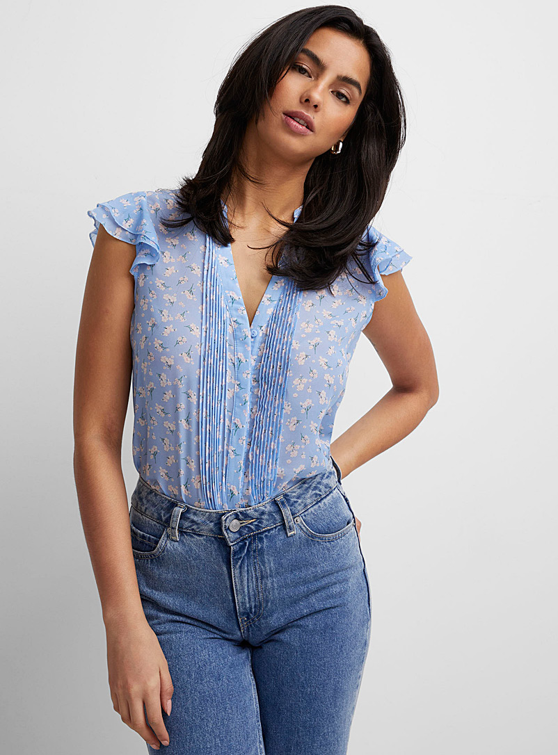 Icône Baby Blue Printed ruffled blouse for women