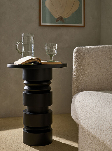 La table d'appoint base sculpturale