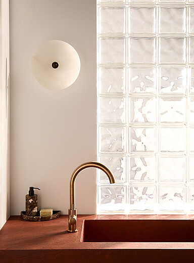 Alabaster saucer wall sconce