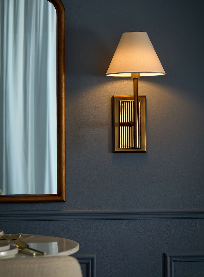 Antique brass finish fluted sconce product image (primary)