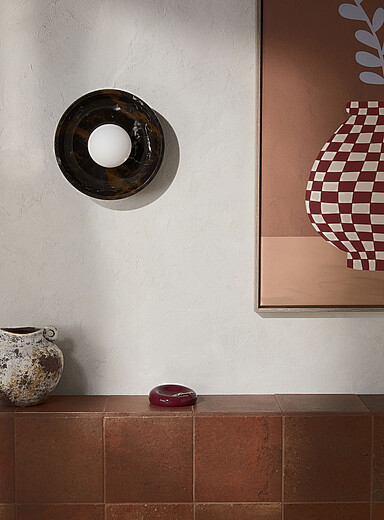 Black marble and opal glass donut wall sconce