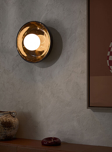 Black marble and opal glass donut wall sconce