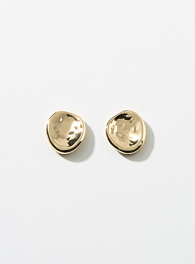 Les petites boucles d'oreilles ovales martel&eacute;es