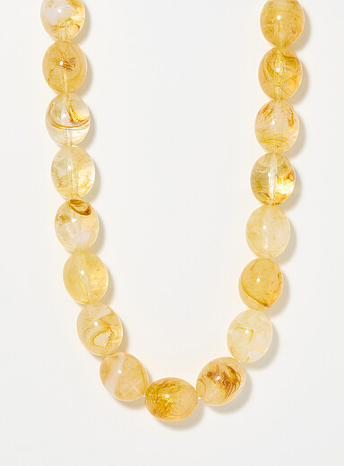 Le collier billes r&eacute;sine ambr&eacute; Still