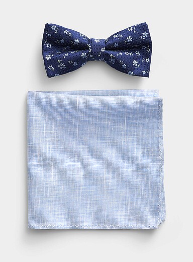 Le duo pochette et n&oelig;ud papillon fleur bleu p&acirc;le