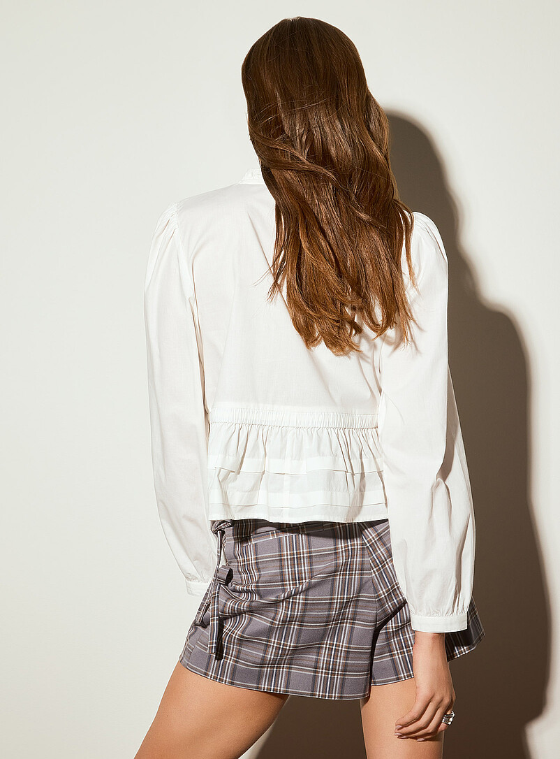 Frill-collar tie peplum blouse | Icône | | Simons