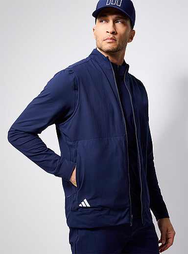 La veste de golf sans manche jersey et toile Ultimate365