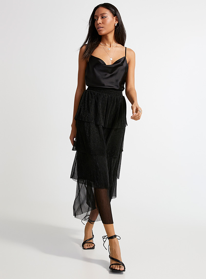Icône: La longue jupe scintillante à volants Noir pour femme