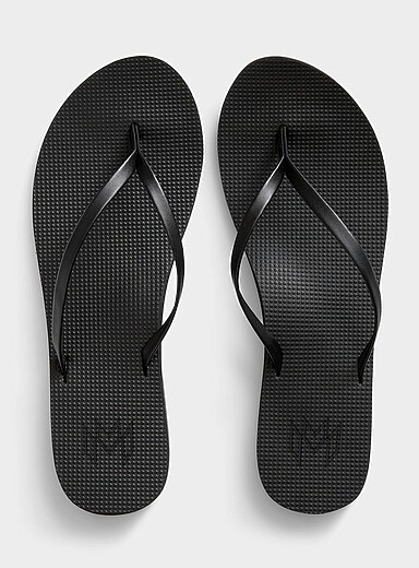 La sandale de plage minimaliste noire Femme