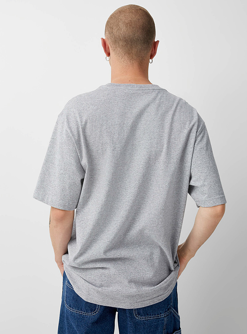 Carhartt: Le t-shirt workwear à pochette Jaune foncé pour homme