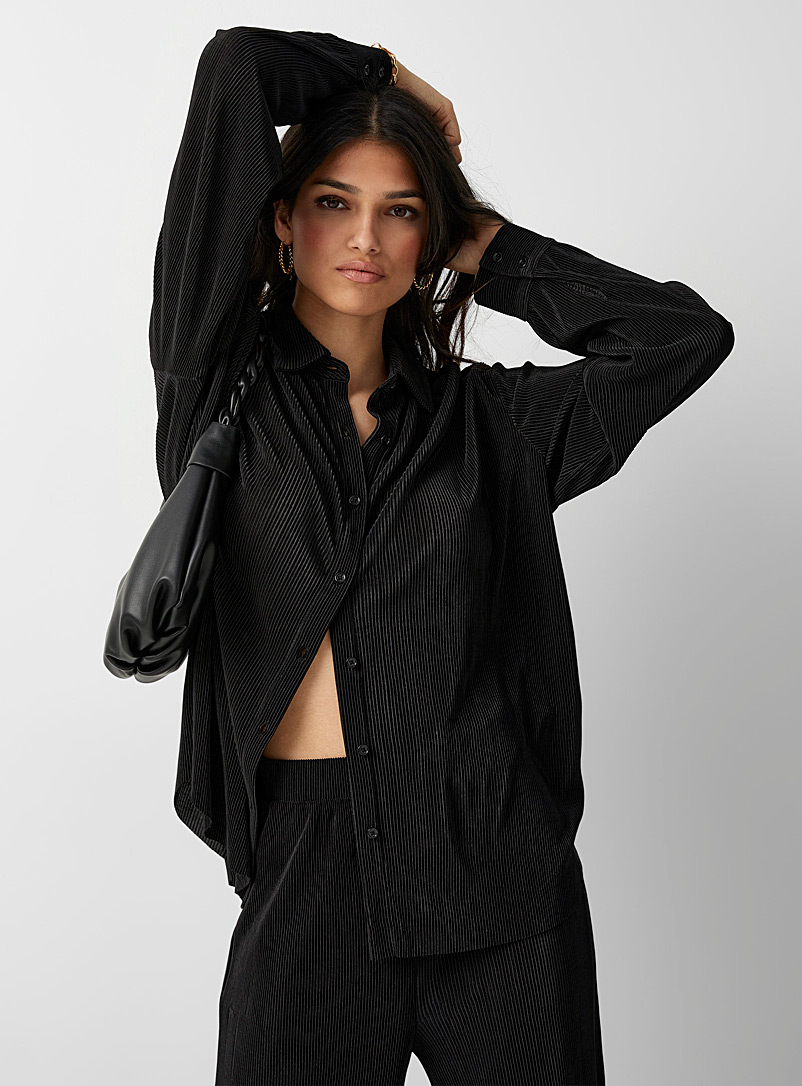 Icône: La chemise ample plissée Noir pour femme