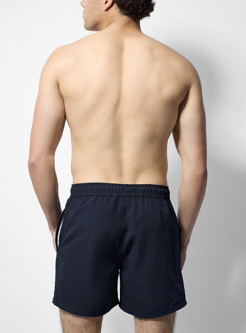 Simons: Le maillot short couleur unie Vert fonc&eacute; - Mousse pour homme