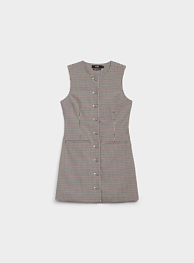 La minirobe boutonn&eacute;e &agrave; carreaux