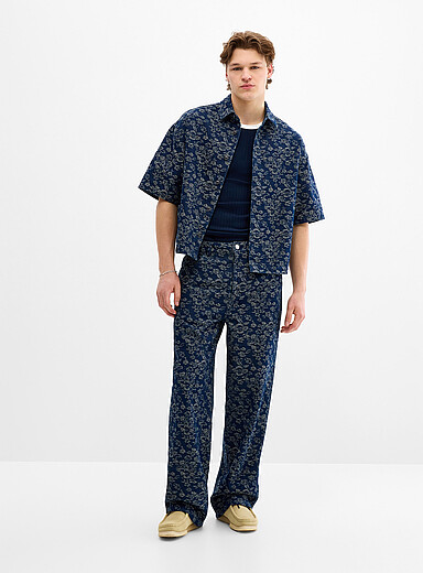 Le jean 5 poches jacquard fleuri <b>Coupe baggy</b>